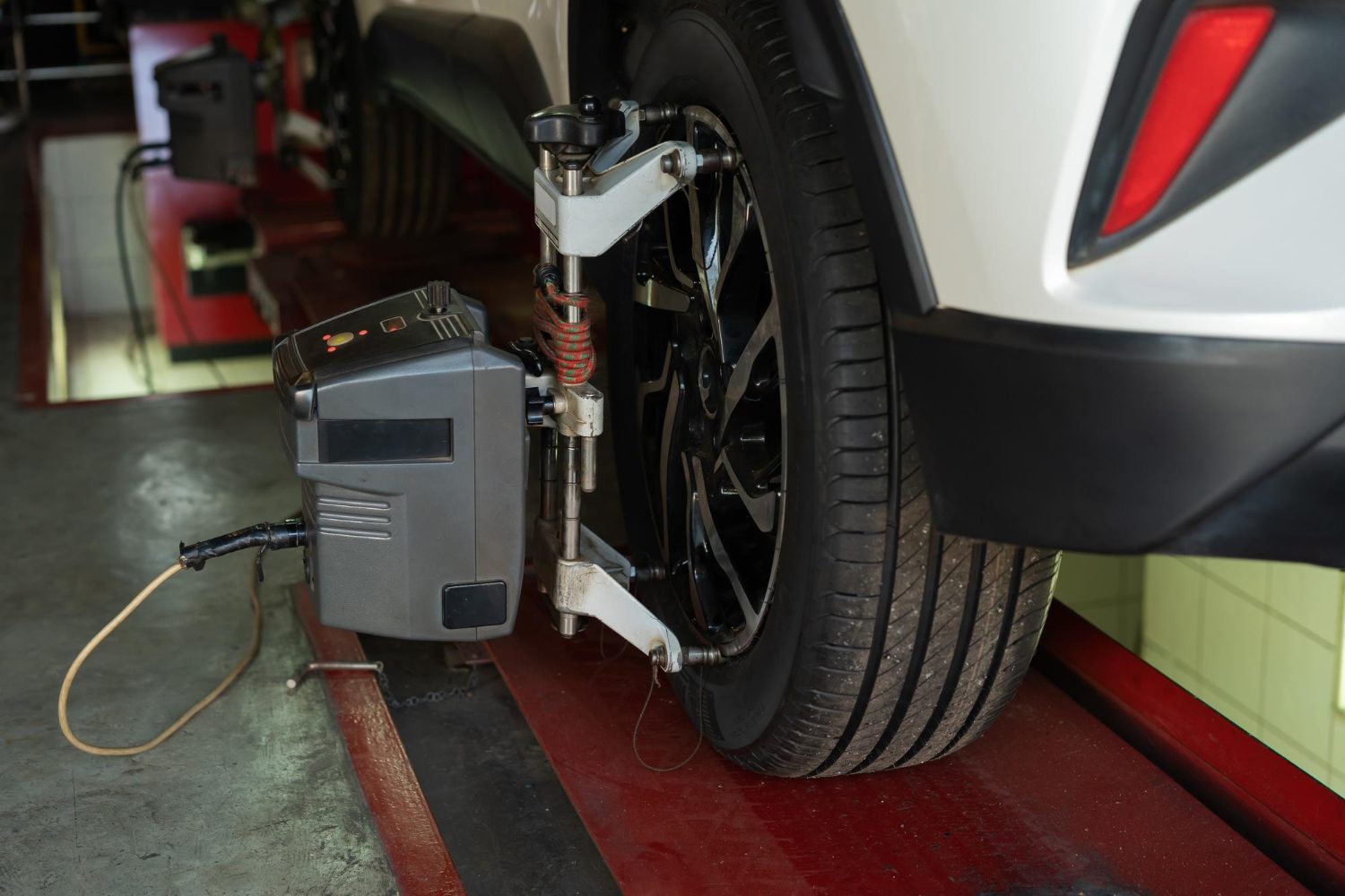 car-wheel-alignment-progress-auto-repair-service-station car-wheel-alignment-progress-auto-repair-service-station